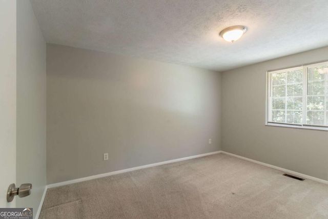 1051 S Millard Way, Stone Mountain, GA 30088