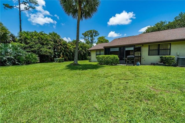 64 Macadamia Court, Royal Palm Beach, FL 33411