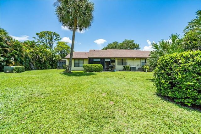 64 Macadamia Court, Royal Palm Beach, FL 33411