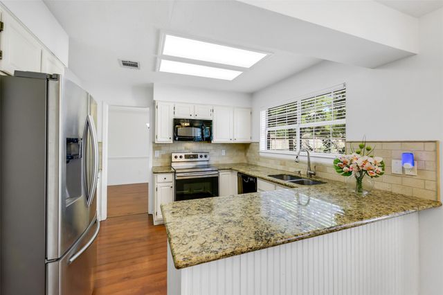 17214 Palm Falls Court, Houston, TX 77095