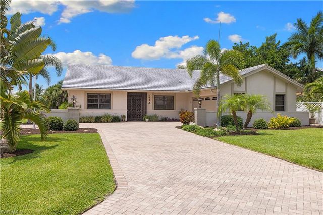 214 Torrey Pines PT, Naples, FL 34113