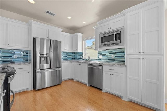 314 Windward Way, Tiki Island, TX 77554
