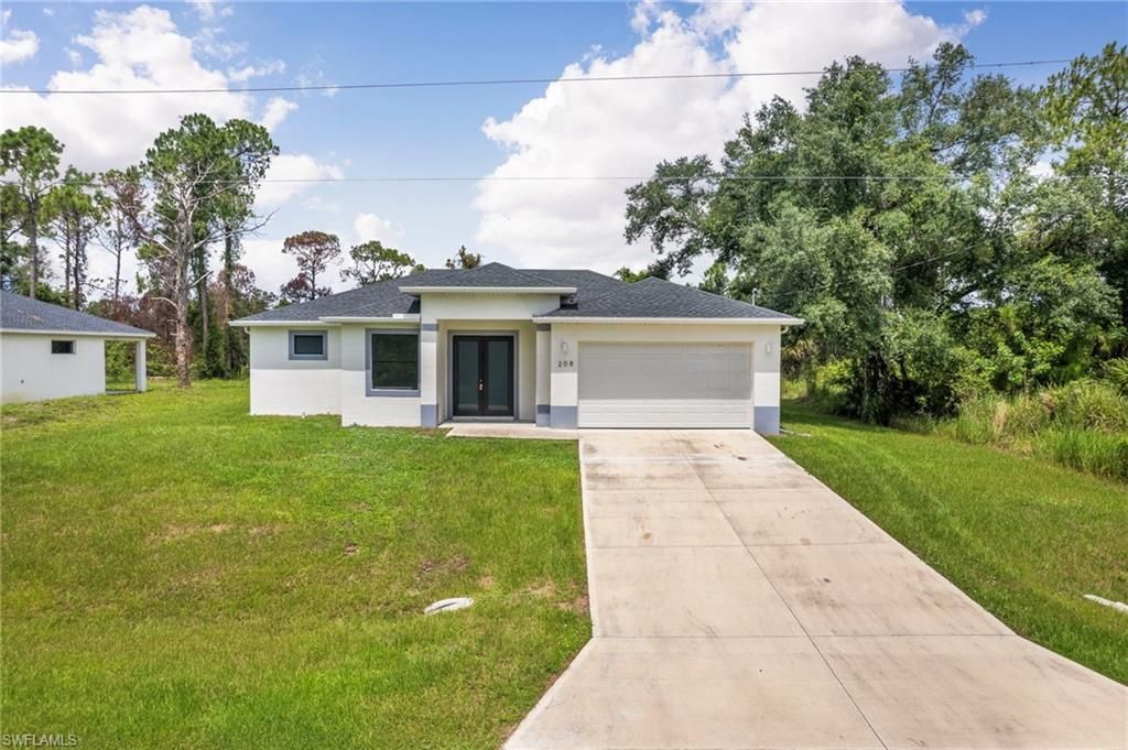 208 Genoa AVE S, LEHIGH ACRES, FL 33974 — exterior