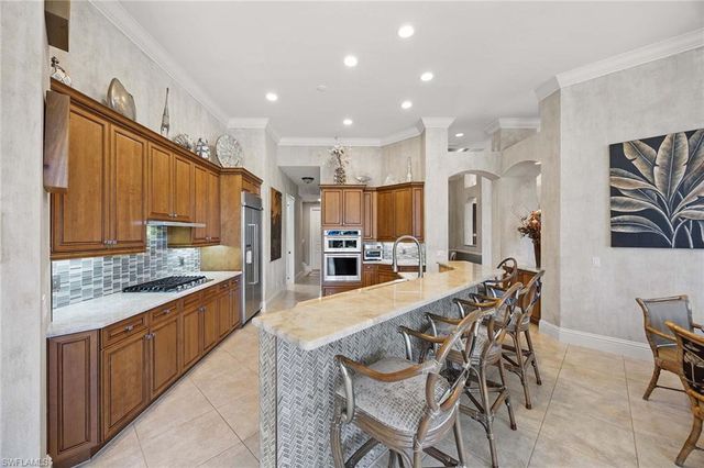 8752 Muirfield DR, Naples, FL 34109