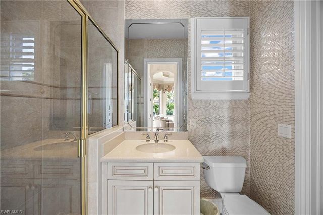 8752 Muirfield DR, Naples, FL 34109