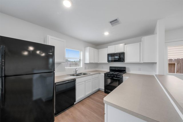 1047 Brighton Orchards Lane, Magnolia, TX 77354