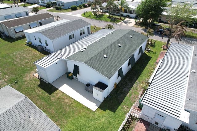 424 Loquat Drive, Barefoot Bay, FL 32976