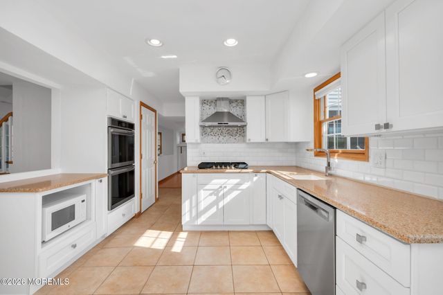 25 Cherry Hill Lane, Manalapan, NJ 07726