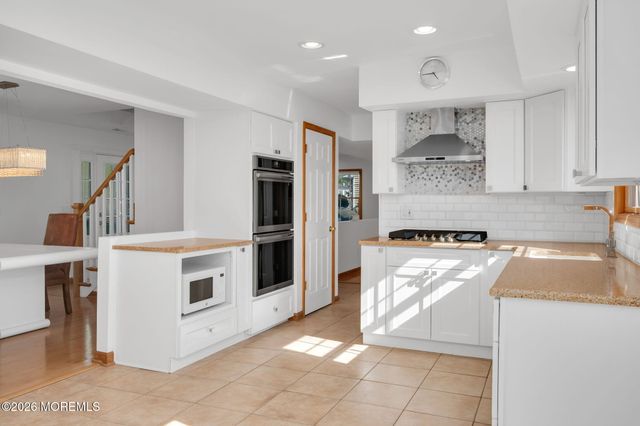 25 Cherry Hill Lane, Manalapan, NJ 07726