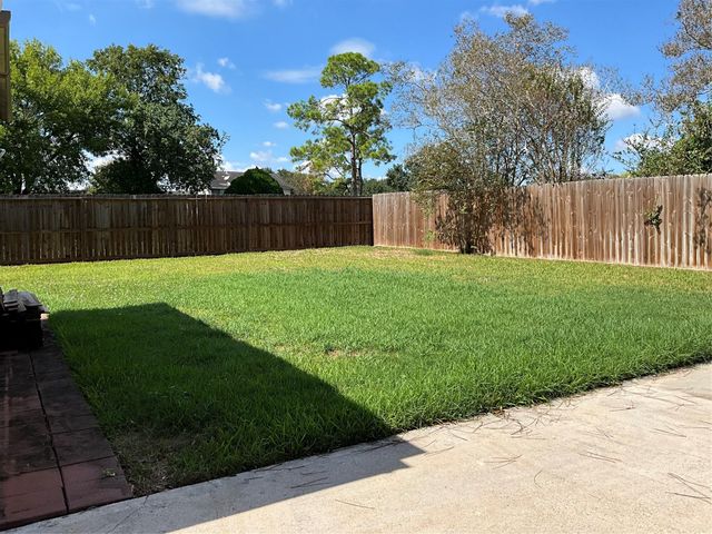 11914 Mulholland Drive, Meadows Place, TX 77477
