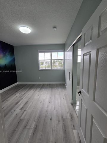 10595 SW 6th St 1103, Pembroke Pines, FL 33025