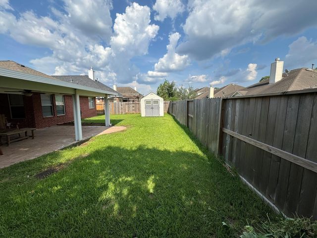 9907 Rushing Springs Drive, Tomball, TX 77375