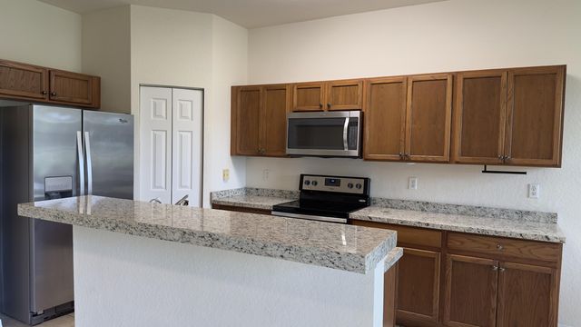 3042 GRANDIFLORA Drive, Greenacres, FL 33467