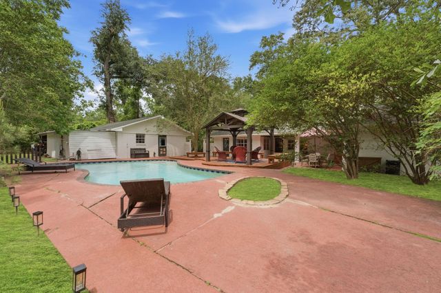 619 Tall Pines Drive, Magnolia, TX 77354