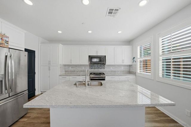 1027 Swaying Palms Way W, San Diego, CA 92154