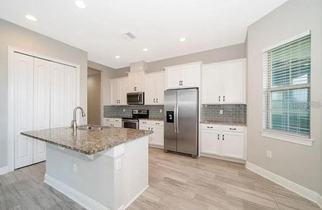 10425 SIDDINGTON DR, Orlando, FL 32832