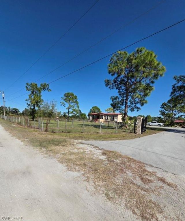 1860 Poinsettia AVE, LEHIGH ACRES, FL 33972 — exterior