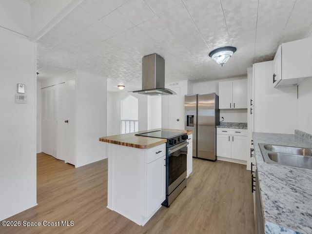 908 Oleander Circle, Barefoot Bay, FL 32976