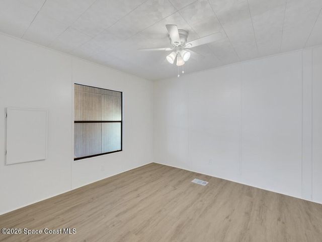 908 Oleander Circle, Barefoot Bay, FL 32976