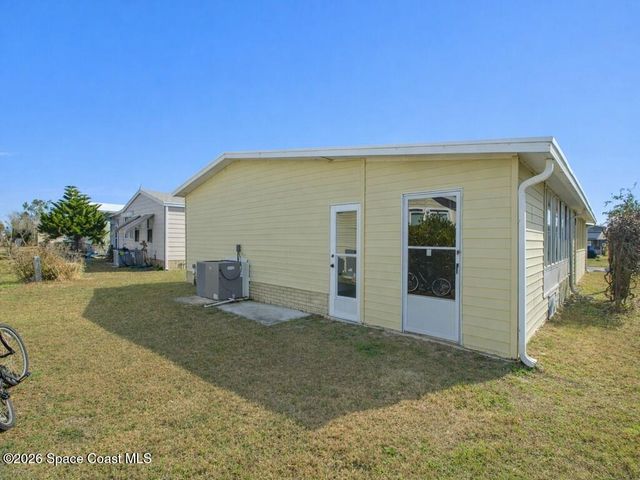 908 Oleander Circle, Barefoot Bay, FL 32976