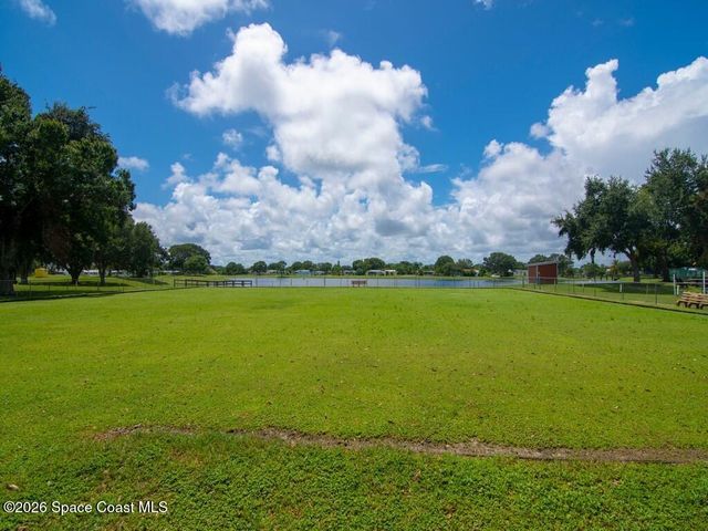 908 Oleander Circle, Barefoot Bay, FL 32976