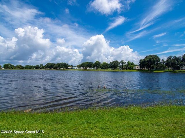 908 Oleander Circle, Barefoot Bay, FL 32976