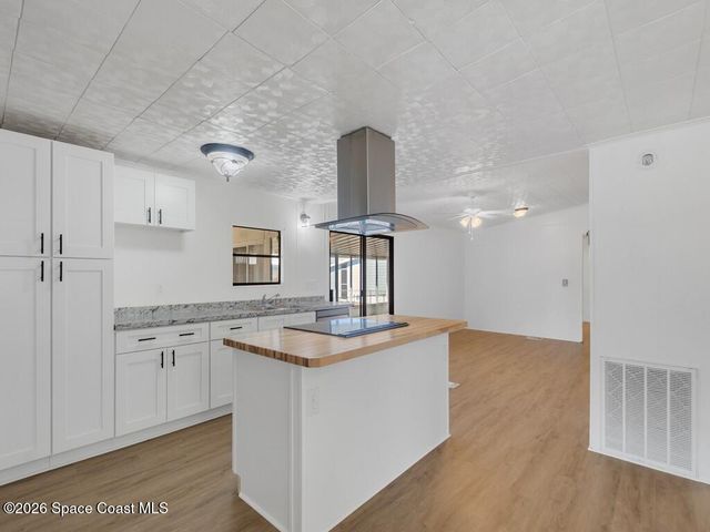 908 Oleander Circle, Barefoot Bay, FL 32976