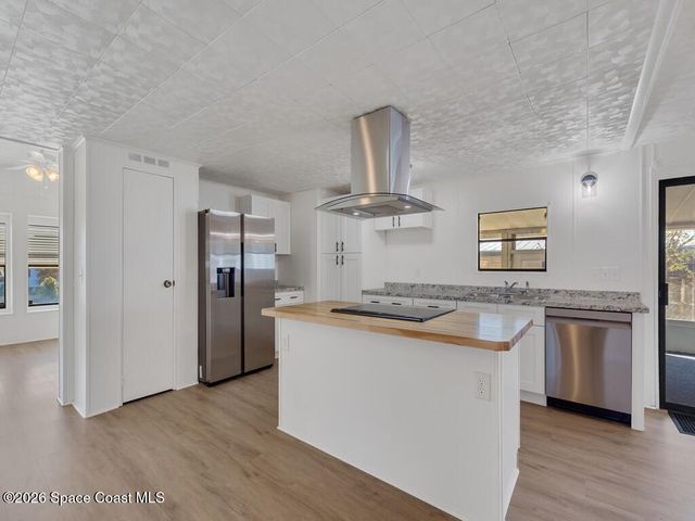908 Oleander Circle, Barefoot Bay, FL 32976
