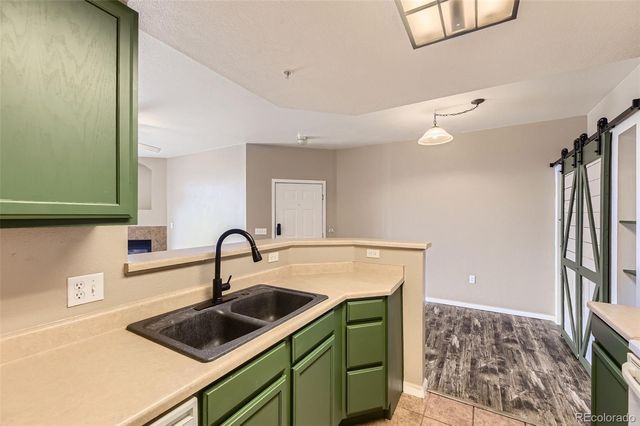 7440 S Blackhawk Street 13-105, Englewood, CO 80112