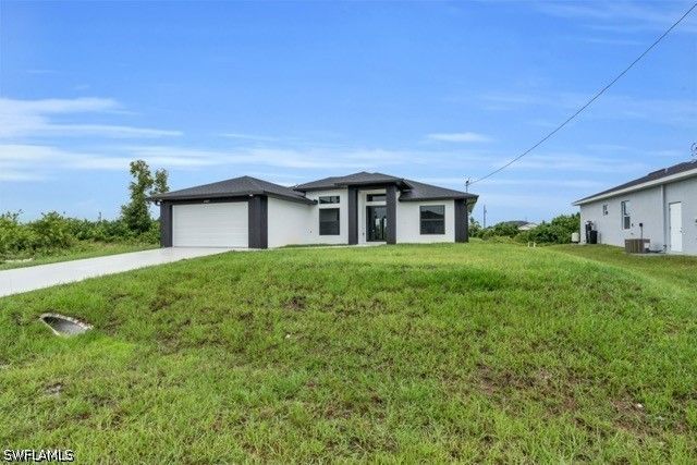 1507 Paula AVE S, Lehigh Acres, FL 33976