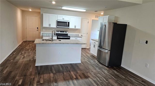 9028 Aegean CIR, Lehigh Acres, FL 33936