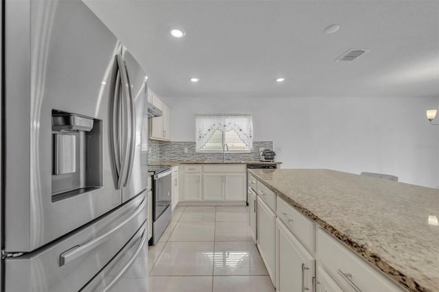 2369 CROSSANDRA STREET, Mascotte, FL 34753