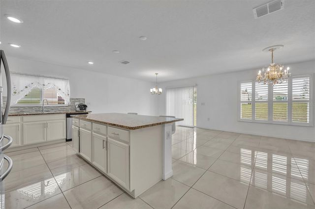 2369 CROSSANDRA STREET, Mascotte, FL 34753