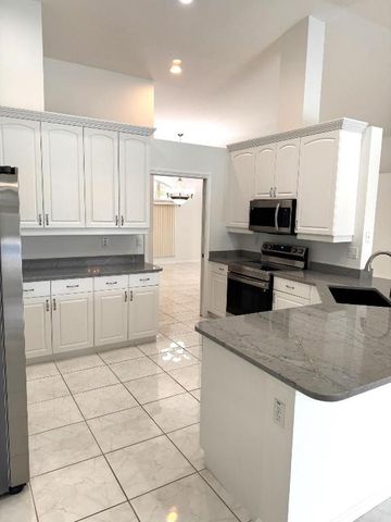 106 Pepper Tree Crescent, Royal Palm Beach, FL 33411