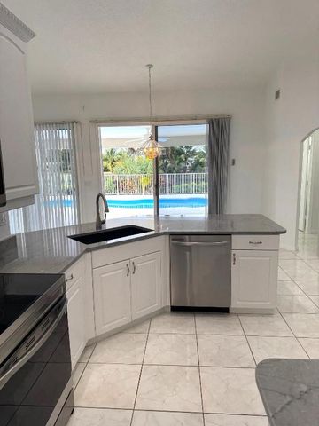 106 Pepper Tree Crescent, Royal Palm Beach, FL 33411