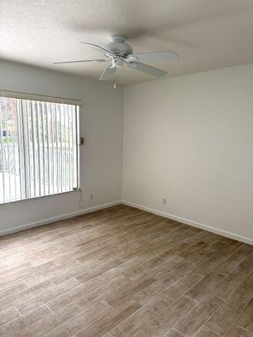 106 Pepper Tree Crescent, Royal Palm Beach, FL 33411