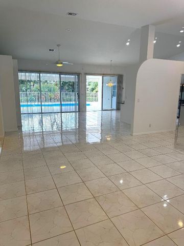 106 Pepper Tree Crescent, Royal Palm Beach, FL 33411