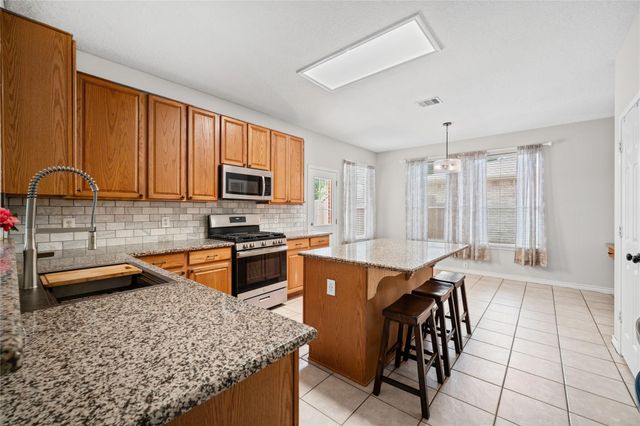 18702 Woodbreeze Drive, Humble, TX 77346