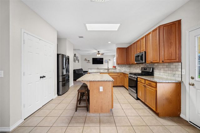 18702 Woodbreeze Drive, Humble, TX 77346