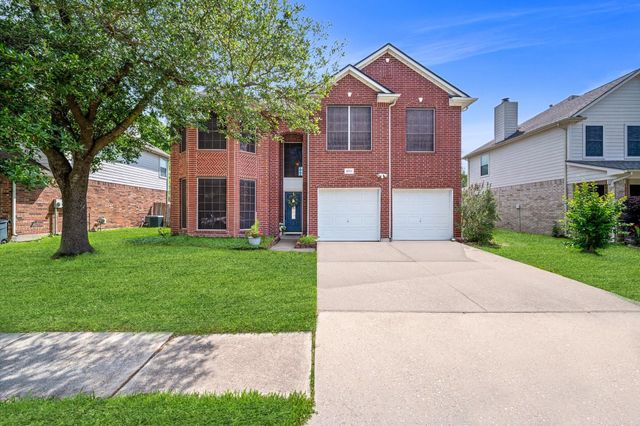 18702 Woodbreeze Drive, Humble, TX 77346