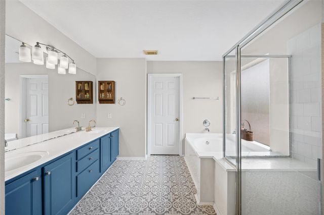 18702 Woodbreeze Drive, Humble, TX 77346