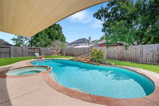 18702 Woodbreeze Drive, Humble, TX 77346