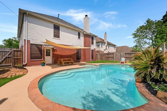 18702 Woodbreeze Drive, Humble, TX 77346