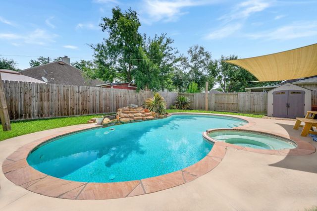 18702 Woodbreeze Drive, Humble, TX 77346