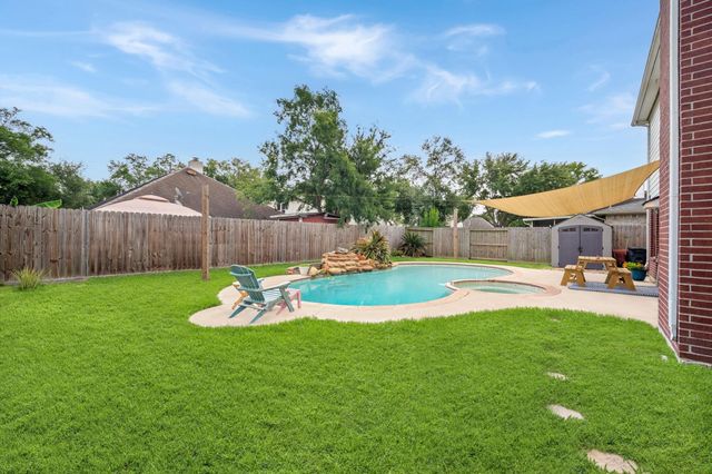 18702 Woodbreeze Drive, Humble, TX 77346