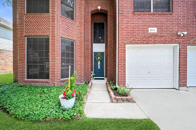 18702 Woodbreeze Drive, Humble, TX 77346