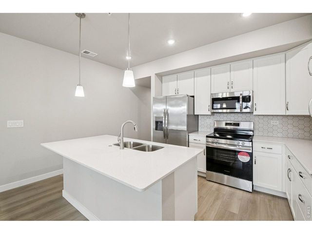 410 High Point Dr B-104, Longmont, CO 80504