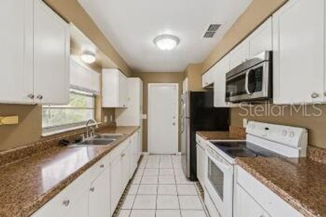 6144 RHYTHM CIRCLE, Orlando, FL 32808