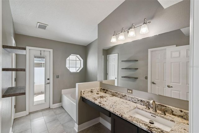 2242 AITKIN LOOP, Leesburg, FL 34748