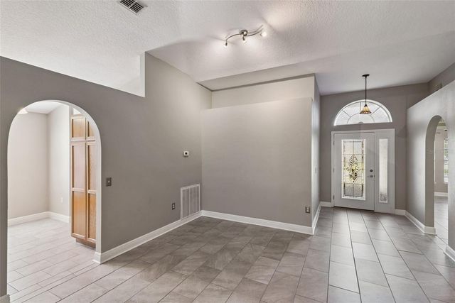 2242 AITKIN LOOP, Leesburg, FL 34748